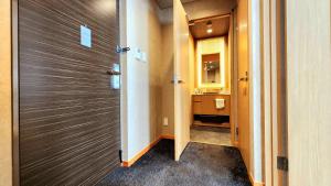 Koupelna v ubytování ひがし茶屋街らしく金沢 Hotel Rashiku kanazawa + 37 fotografií