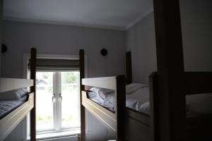 Postel nebo postele na pokoji v ubytování Gammelgården