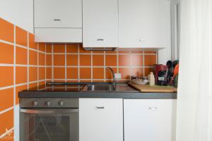 Cucina o angolo cottura di MrBrown Aurelia Residence with Pool