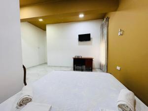 Uma cama ou camas num quarto em Havelock City Hostel, Colombo