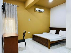 Uma cama ou camas num quarto em Havelock City Hostel, Colombo