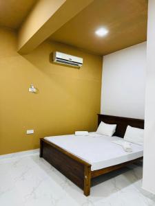 Uma cama ou camas num quarto em Havelock City Hostel, Colombo