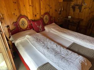 Postel nebo postele na pokoji v ubytování Hotel Garni St. Hubertus