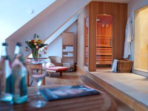 Posezení v ubytování Brauereigasthof-Hotel Aying