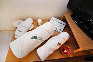 TV a/nebo společenská místnost v ubytování JBI Wellness