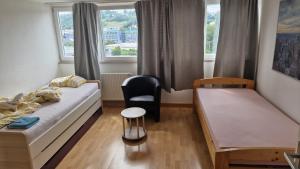 Ένα ή περισσότερα κρεβάτια σε δωμάτιο στο Rooms & Apartments Schwäbisch Gmünd