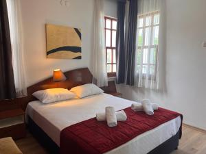 Postel nebo postele na pokoji v ubytování Şima Hotel Kemer