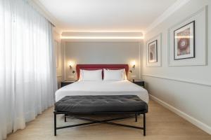 Ένα ή περισσότερα κρεβάτια σε δωμάτιο στο Eurostars San Antón +57 φωτογραφίες