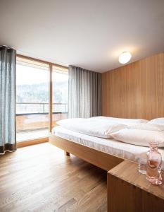 Postel nebo postele na pokoji v ubytování Biohotel Schwanen