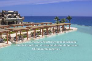 a rendering of a resort with a swimming pool at Sosua private apartments and studios! in Laguna del Higüero