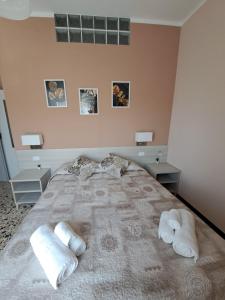 Postel nebo postele na pokoji v ubytování La terrazza del Sole Guest House