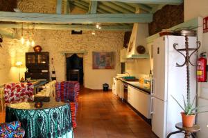 Kuchyň nebo kuchyňský kout v ubytování Casa Rural El Horno de la Aldegüela