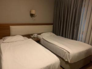 A bed or beds in a room at Reikartz 2017