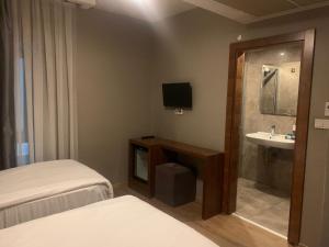 A bed or beds in a room at Reikartz 2017