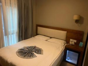 A bed or beds in a room at Reikartz 2017