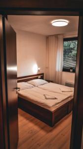 Postel nebo postele na pokoji v ubytování Apartmán Chopok Juh Relax & Enjoy