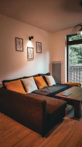 Posezení v ubytování Apartmán Chopok Juh Relax & Enjoy + 17 fotografií