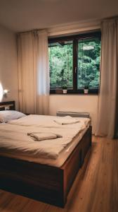 Postel nebo postele na pokoji v ubytování Apartmán Chopok Juh Relax & Enjoy