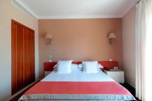 Posteľ alebo postele v izbe v ubytovaní Portofino Mallorca