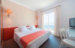 Posteľ alebo postele v izbe v ubytovaní Portofino Mallorca