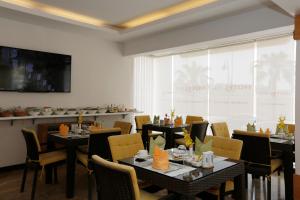 Εστιατόριο ή άλλο μέρος για φαγητό στο Hotelier Suites by Cantonal +47 φωτογραφίες