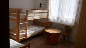 Postel nebo postele na pokoji v ubytování Mittereggalm