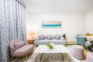 Posezení v ubytování Al Bustan Centre & Residence