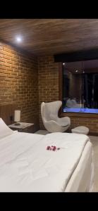 Cama ou camas em um quarto em Cactus Chalés & Cabanas em lumiar