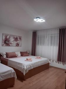 Posteľ alebo postele v izbe v ubytovaní Apartment Radalj