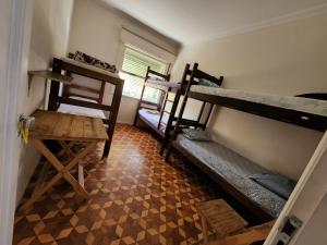 Postel nebo postele na pokoji v ubytování Hostel Capivara's Curitiba