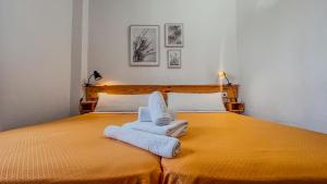 Postel nebo postele na pokoji v ubytování La Tortuga Lodging Rooms