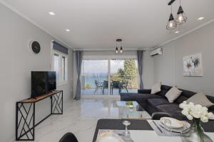 Et tv og/eller underholdning på The Iconic Sea View Cottage