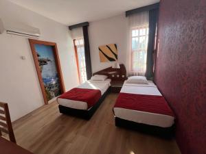 Postel nebo postele na pokoji v ubytování Şima Hotel Kemer
