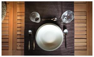 a table with a mirror and utensils on it at La Canciella de Mijares in Mijares +74 photos