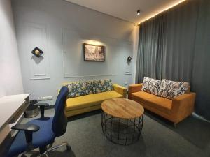 Posezení v ubytování Mallenzo Suites Dlf Phase 1
