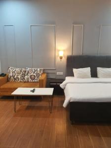 Posezení v ubytování Mallenzo Suites Dlf Phase 1