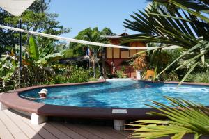 Bazén v ubytování Chalet Tropical nebo v jeho okolí