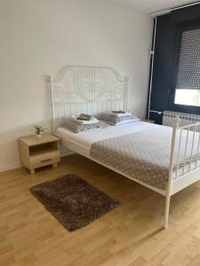 Ένα ή περισσότερα κρεβάτια σε δωμάτιο στο Rocco Apartment-FREE PARKING&WIFI +60 φωτογραφίες