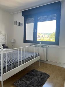 Ένα ή περισσότερα κρεβάτια σε δωμάτιο στο Rocco Apartment-FREE PARKING&WIFI