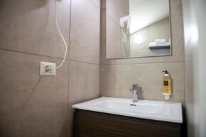 Koupelna v ubytování VILLA FENIX OSIO SOTTO 2