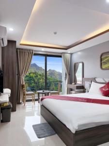 Postel nebo postele na pokoji v ubytování Boutique En Hotel Sapa