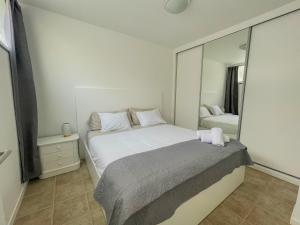 Ένα ή περισσότερα κρεβάτια σε δωμάτιο στο Villa Supranee Relaxation