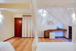 Cama ou camas em um quarto em Paraíso Ecológico Pousada & SPA