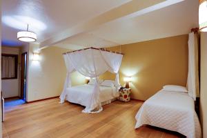Cama ou camas em um quarto em Paraíso Ecológico Pousada & SPA