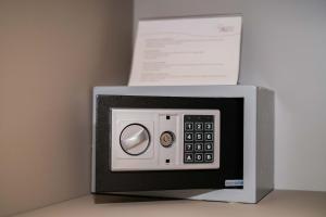 a microwave oven sitting on top of a table at Napoli Class in Naples