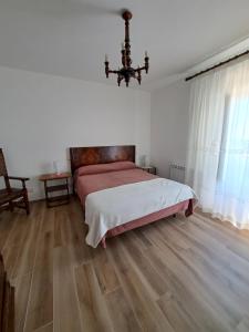 Postel nebo postele na pokoji v ubytování Le Scalette