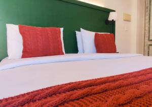 Cama ou camas em um quarto em Kastel Grão Pará