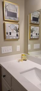a bathroom with a sink and a mirror at EastGate 11B in Hammond