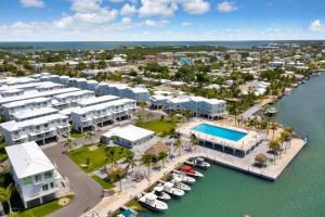an aerial view of a resort with a marina at Ocean Breeze Gated Community in Marathon