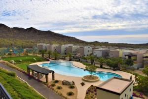 an aerial view of an apartment complex with a swimming pool at 2BD-2BA Condo at Ventanas 3B in Cabo San Lucas